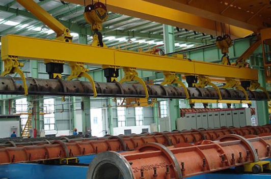 回轉(zhuǎn)型管樁生產(chǎn)線的平面布置方案對(duì)比